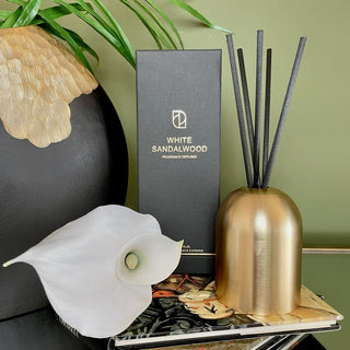 Gold Case Reed Diffuser in White Sandalwood.